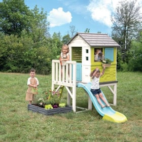 casa de la playa con arenero